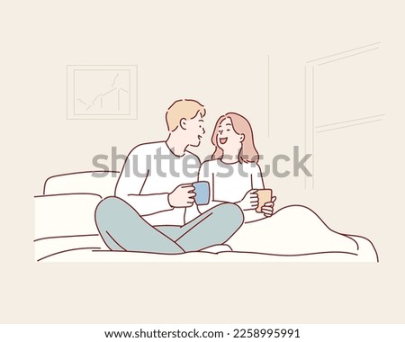 happy couple drinking coffee in bed at morning. Hand drawn style vector design illustrations.