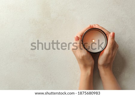 Similar – Image, Stock Photo Woman holding a candle at night, during the Easter celebrations