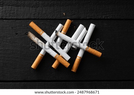 Similar – Image, Stock Photo Filter cigarette lies on a wooden table