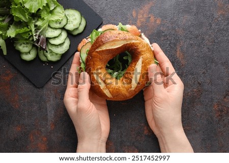 Image, Stock Photo Vegetable bagel sandwich on wooden table