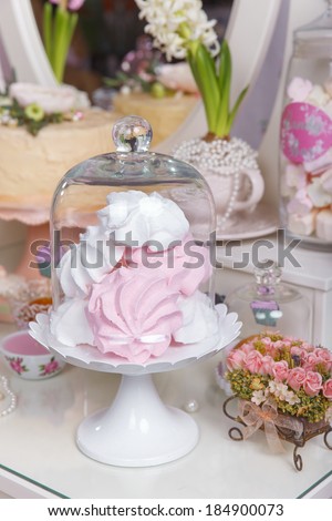 Dessert table for a party. cake, sweets and flowers