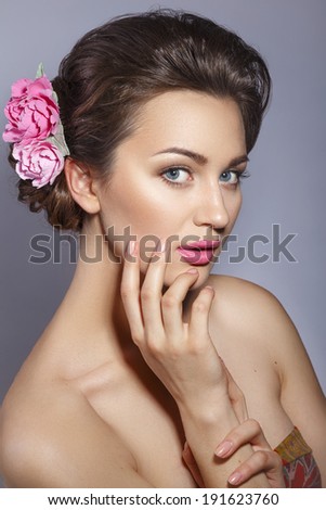 Beautiful Woman Touching her Face. Youth and Skin Care Concept. Spa woman.Beautiful woman with professional make up .
