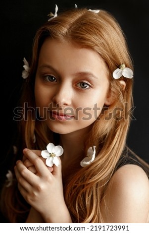 Image, Stock Photo Cute redhead little girl looking at us and smiling