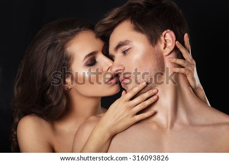 Sexy beauty couple.Kissing couple portrait.Sensual brunette woman in underwear with young lover, passionate couple foreplay closeup.Sexy couple in intimacy relations