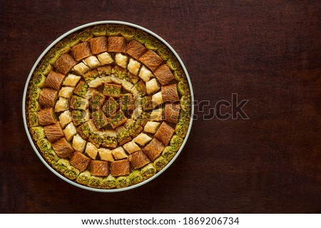  Traditional turkish, arabic sweets baklava assortment with pistachio. Top view, copy space                                   