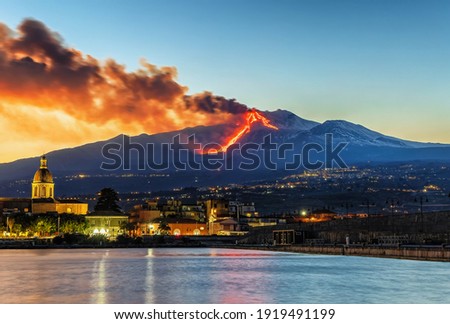 Panorama of the Ionian coast of Etna during the eruption of Etna