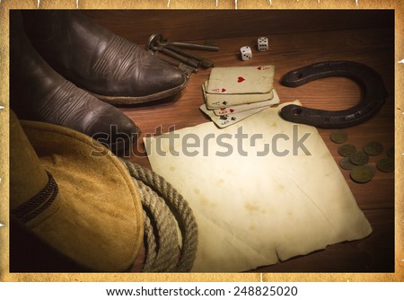 American west background with poker cards and cowboy clothes.Old paper for design