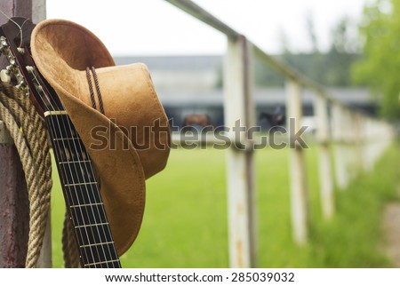 Cowboy hat and guitar.American country music background