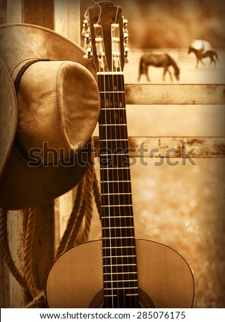 American country music background with cowboy hat and guitar