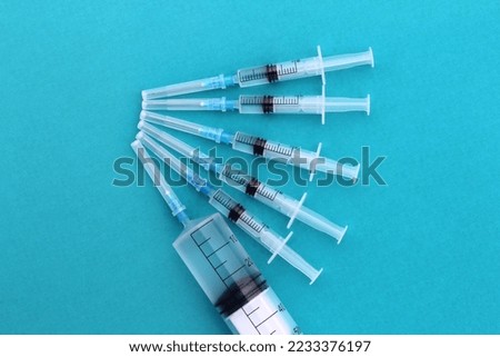 Similar – Image, Stock Photo Large group of syringes