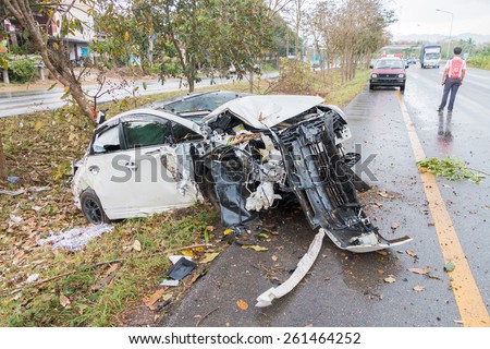 Chumpon, Thailand Febuary 24 :Car crash with the tree on highway road on site of accident. Thailand on Febuary 24, 2015