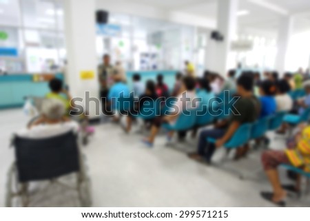 Blurred image of unidentified people and patient waiting doctor or medicine in hospital.