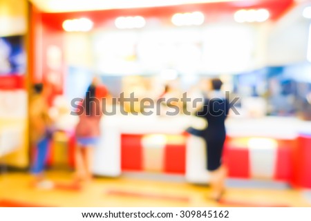 Blurred image of people shop at food center to buy something eat