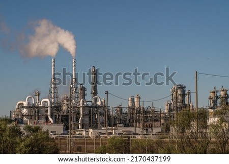 Similar – Industrial smoke stacks and beautiful cloudy sky