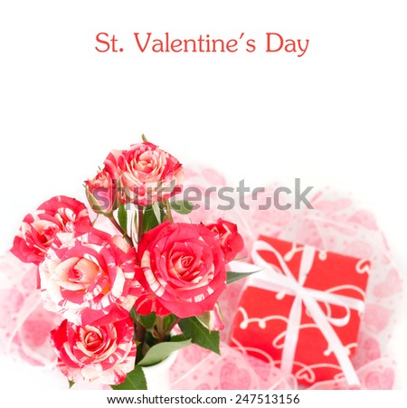 Roses of an unusual color and a red gift box on a white background.