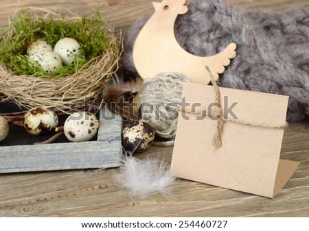 Easter background with eggs in a nest, wooden chicken and a place for the text.
