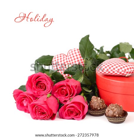 Bouquet of roses, hearts and box of chocolates on a white background. Festive background.