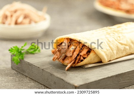 Similar – Foto Bild Döner oder Schawarma-Sandwich auf Holztisch.