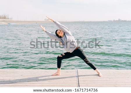 Similar – Image, Stock Photo Stylish sportsman near female partner on city street