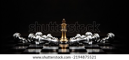Similar – Image, Stock Photo Player moves a chess piece on a chessboard