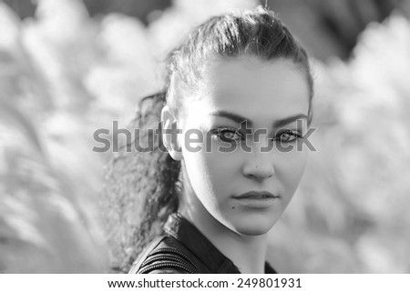 Girl with beautiful eyes in the nature black and white