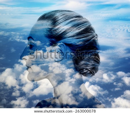 Double exposure of pretty girl profile and cloudscape