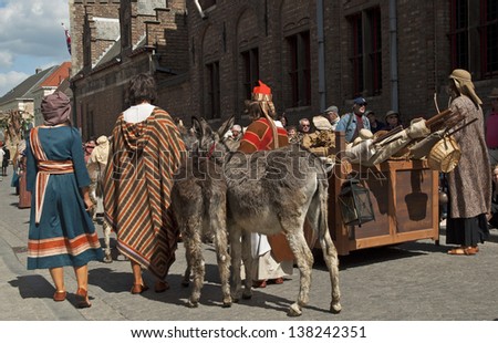 BRUGES, BELGIUM - MAY 9: Annual Procession of the Holy Blood on Ascension Day. Locals perform a historical reenactment and dramatizations of Biblical events in the city. May 9, 2013 in Bruges, Belgium