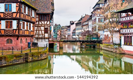 STRASBOURG, FRANCE - MARCH 19: Cafes in Petite-France on March 19, 2013 in Strasbourg. Petite-France is an historic area in the center of Strasbourg.