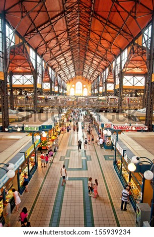 BUDAPEST, HUNGARY - 29 JULY, 2013: People shopping in the Great Market Hall on July 29, 2013 in Budapest, Hungary. Great Market Hall is the largest indoor market in Budapest, it was built in 1896.