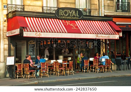 PARIS, FRANCE - 07 SEPTEMBER, 2014: Typical bar in the old town of Paris, France on 7 September 2014. Paris is one of the most populated metropolitan areas in Europe full of bars and cafes.