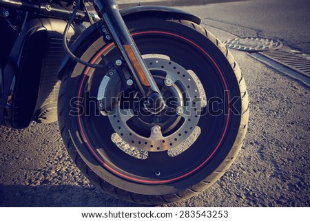 The wheel of a motorbike