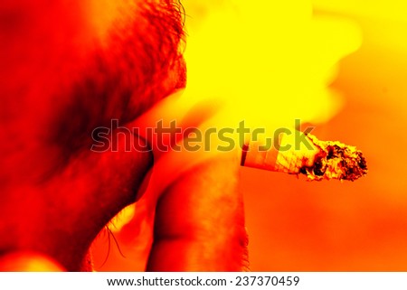 Cigarette in mouth. Bad habit, addiction, problems with health