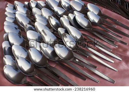 collection of teaspoons in different perspectives