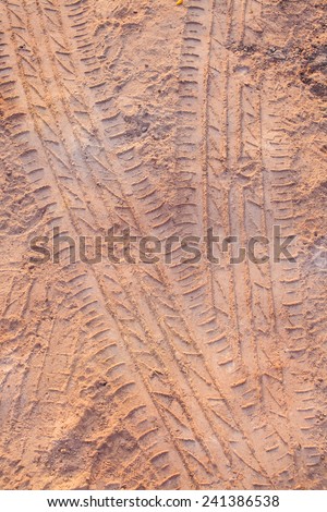 Ribbed tire traces . Background for articles about traveling, transport and ecology