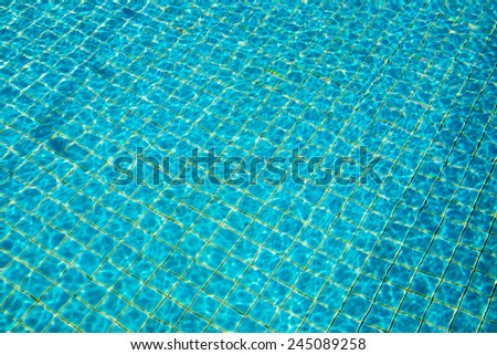 The bottom of a pool view from above through the water, seamless