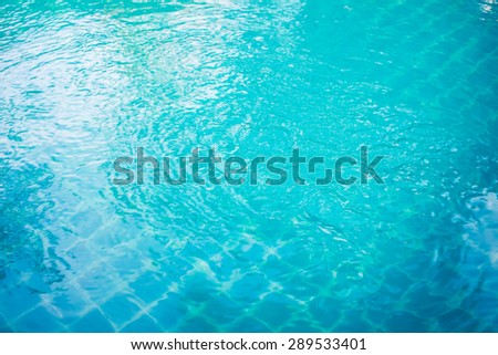 Pure blue water in the pool. Water background.