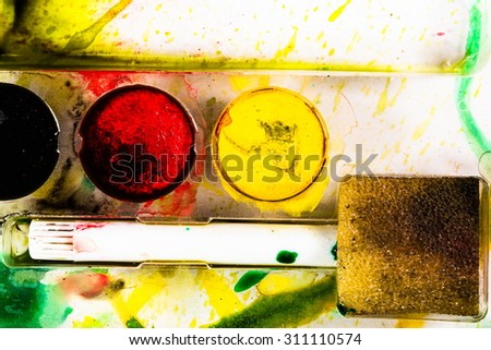 art still life - watercolor palette, jars with gouache, paint brushes