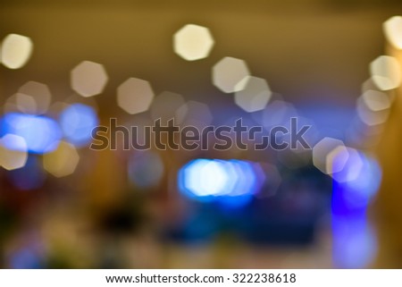 blurred light in warm tone backgrounds : blur of department store shopping concept: out of focus concept.