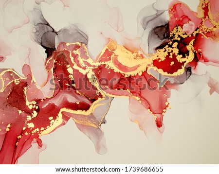 Beautiful oriental background. Fluid art, alcohol ink mixture of colors creating transparent waves and swirls. Perfect for posters, cards, other printed materials. Red and gold design.