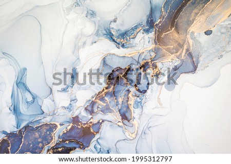 High resolution. Luxury abstract fluid art painting in alcohol ink technique, mixture of dark blue, gray and gold paints. Imitation of marble stone cut, glowing golden veins. Tender and dreamy design. Stock foto © 