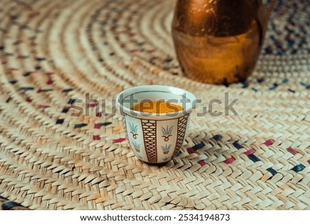 Similar – Image, Stock Photo Dates, teapot, cup with tea near the fire in the desert with a beautiful background