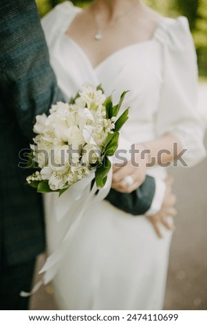 Image, Stock Photo Bride shows her beautiful lace wedding garter.