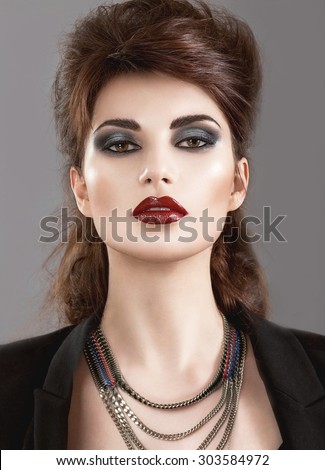 Beautiful Girl in the Gothic style with bright makeup. Beauty face.
