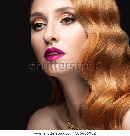 Beautiful red hair woman with evening make-up, pink lips and curls. Beauty face.