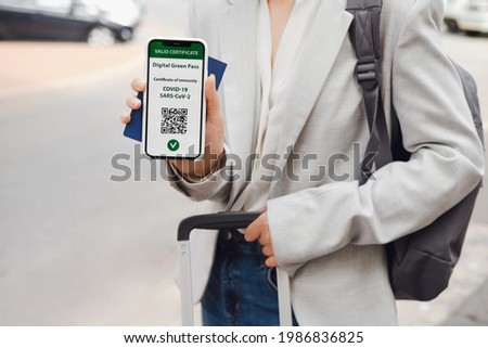 Similar – Image, Stock Photo Unrecognized person passing a marijuana joint to his friend during a party.