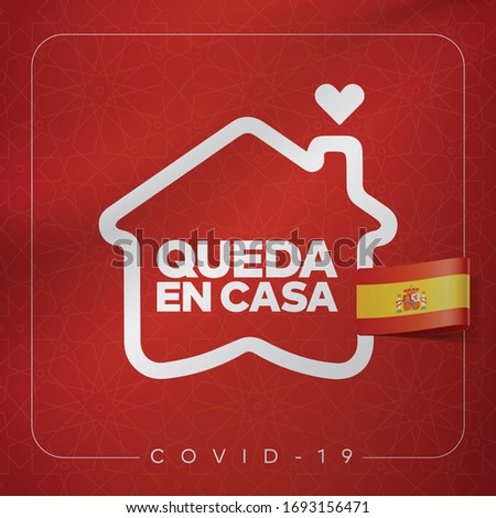 Stay home, stay safe. Covid 19 coronavirus quarantine. Protection campaign or measure from coronavirus. New Coronavirus, slogan with house and heart inside.  Translation: Queda en casa, spanish flag.