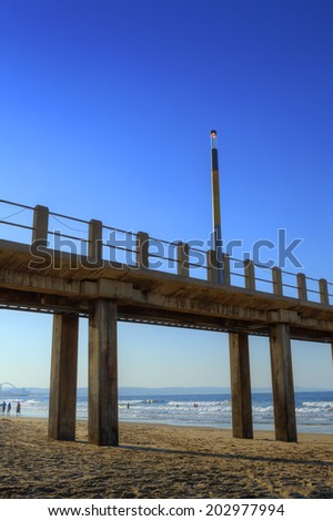Pier in Late Afternoon on Golden Mile Beach, Durban, South Africa