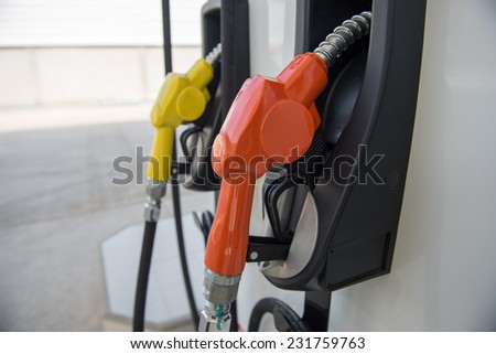 Colorful fuel oil gasoline dispenser at petrol filling station