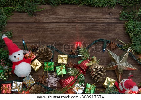 christmas team,Christmas rustic background decoration with snowman on a wooden floor