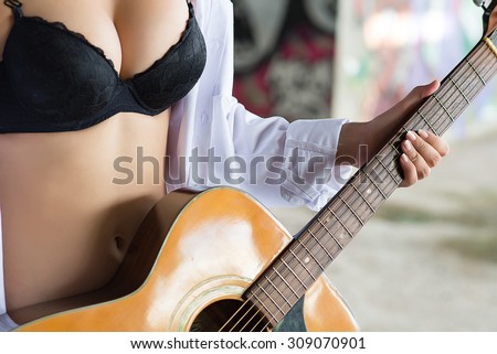 Sexy woman Playing the Guitar,Music Team